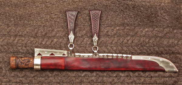 Weight: Sax:12oz.(350g), Sheathed:1lb. 5oz. (600g),&nbsp;&nbsp;&nbsp;&nbsp;P.O.B. 2in (5cm) forward of boster. <br/>Length: Sax:17 1/4in.(44cm), Sheathed:18in. (46cm).