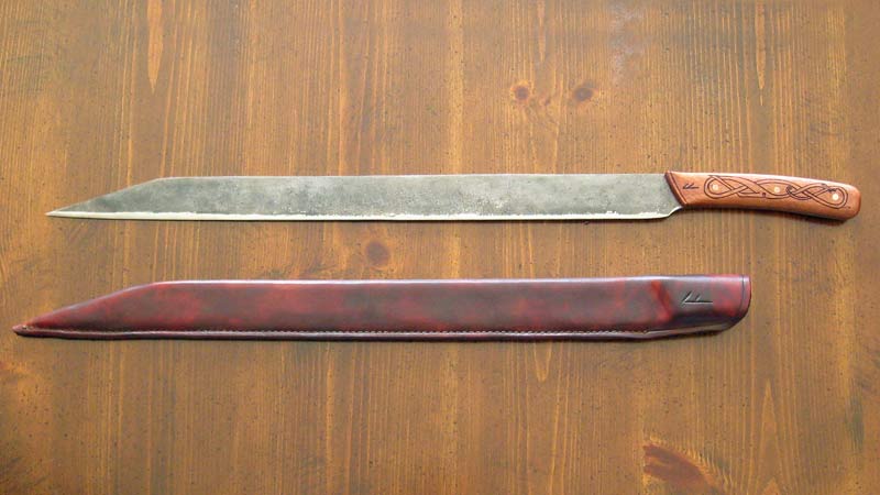 Hand forged 1075 steel blade with forge finish.