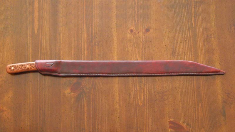 Hand crafted leather scabbard.